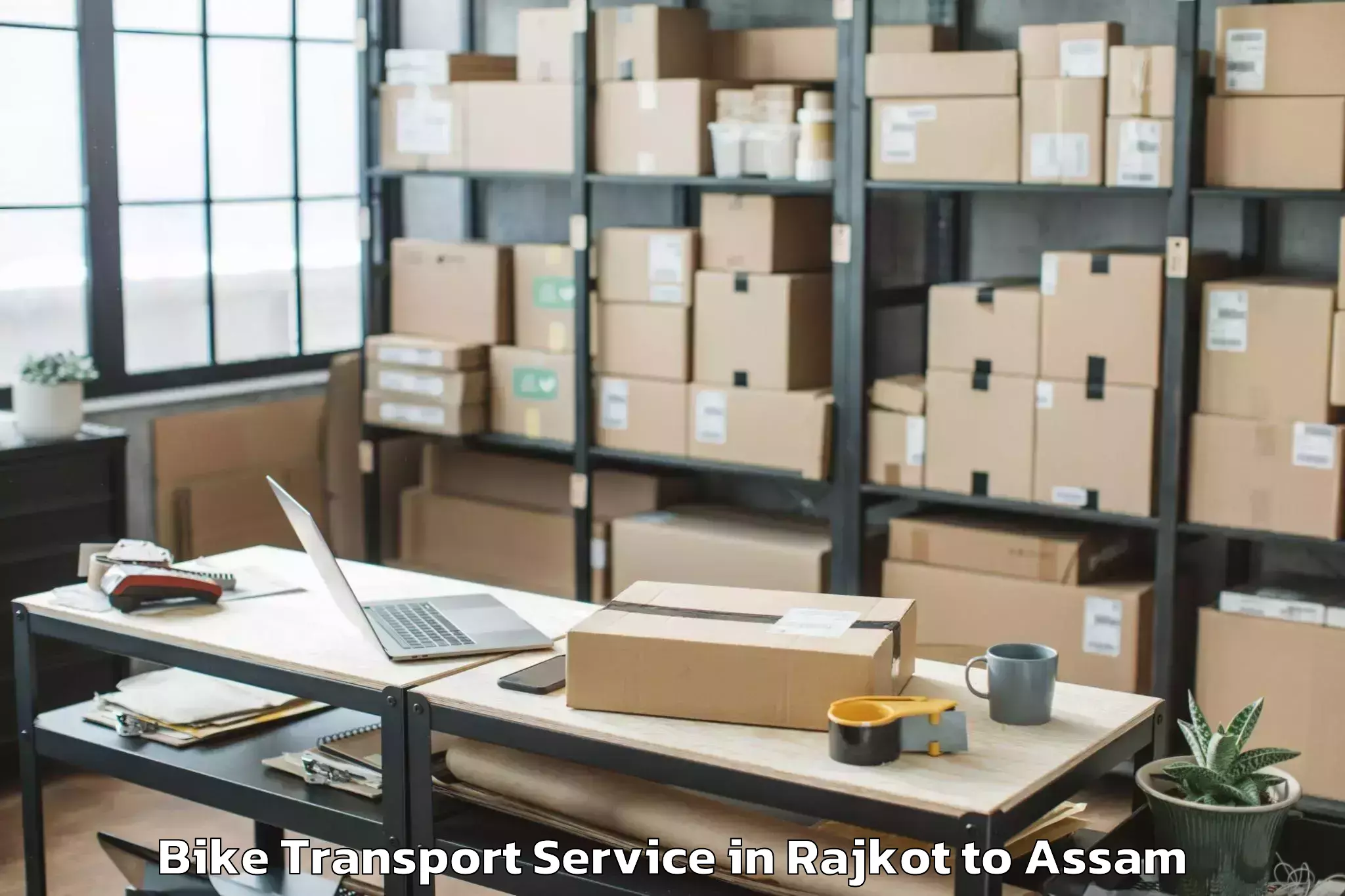 Reliable Rajkot to Basugaon Bike Transport